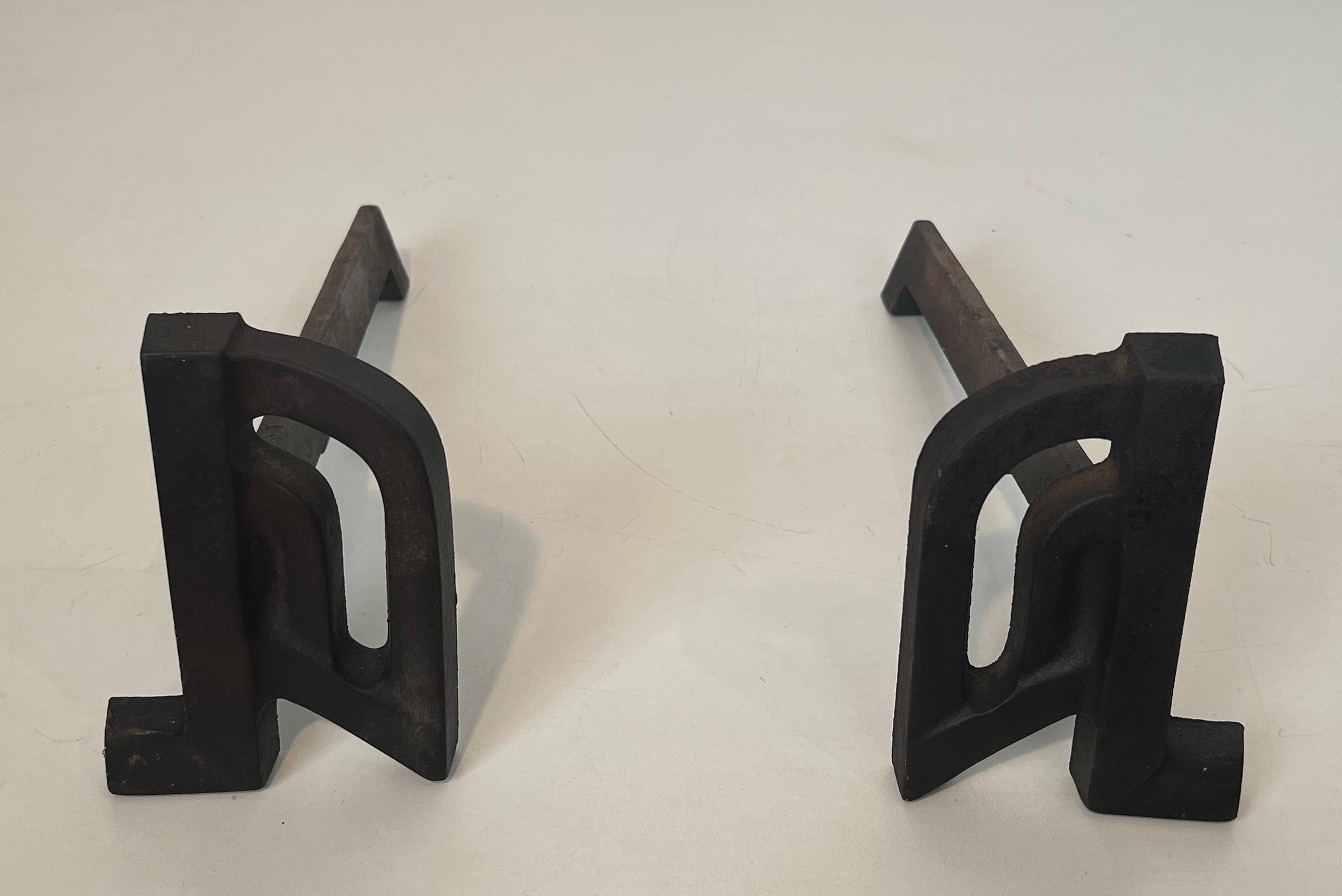 Cast Pair of modernist cast iron and wrought iron andirons. French work. Circa 1940 For Sale