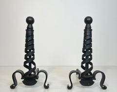 Pair of Modernist Cast Iron and Wrought Iron Andirons. Raymond Subes.