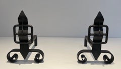 Pair of Modernist Cast Iron and Wrought Iron Belt Andirons