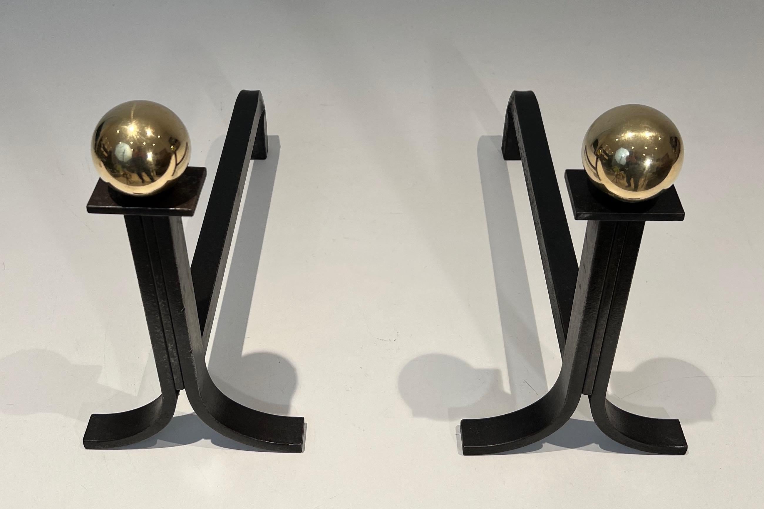 Mid-Century Modern Pair of Modernist Cast Iron, Brass and Wrought Iron Andirons in the Style of Jac For Sale