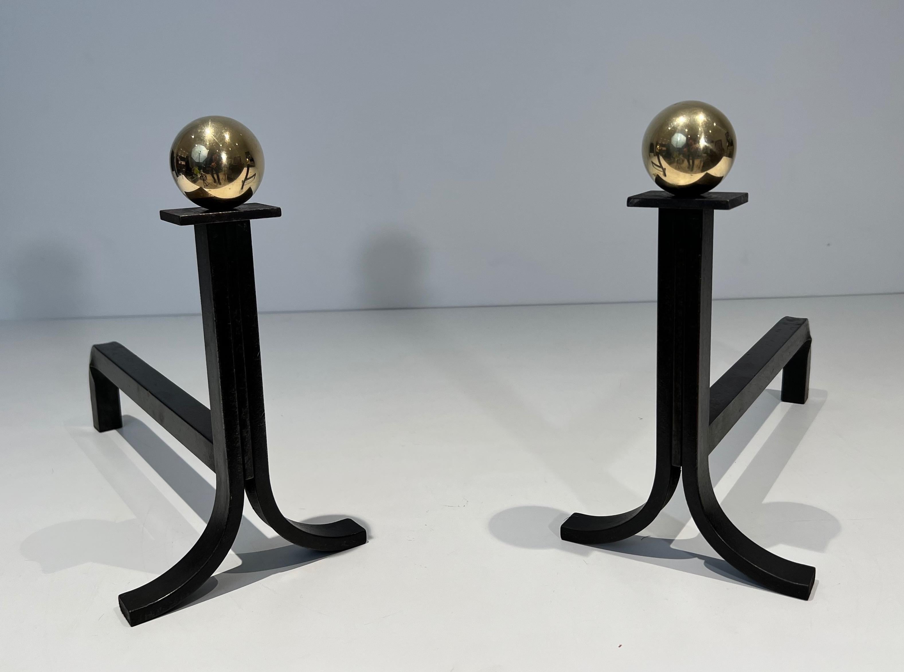 French Pair of Modernist Cast Iron, Brass and Wrought Iron Andirons in the Style of Jac For Sale