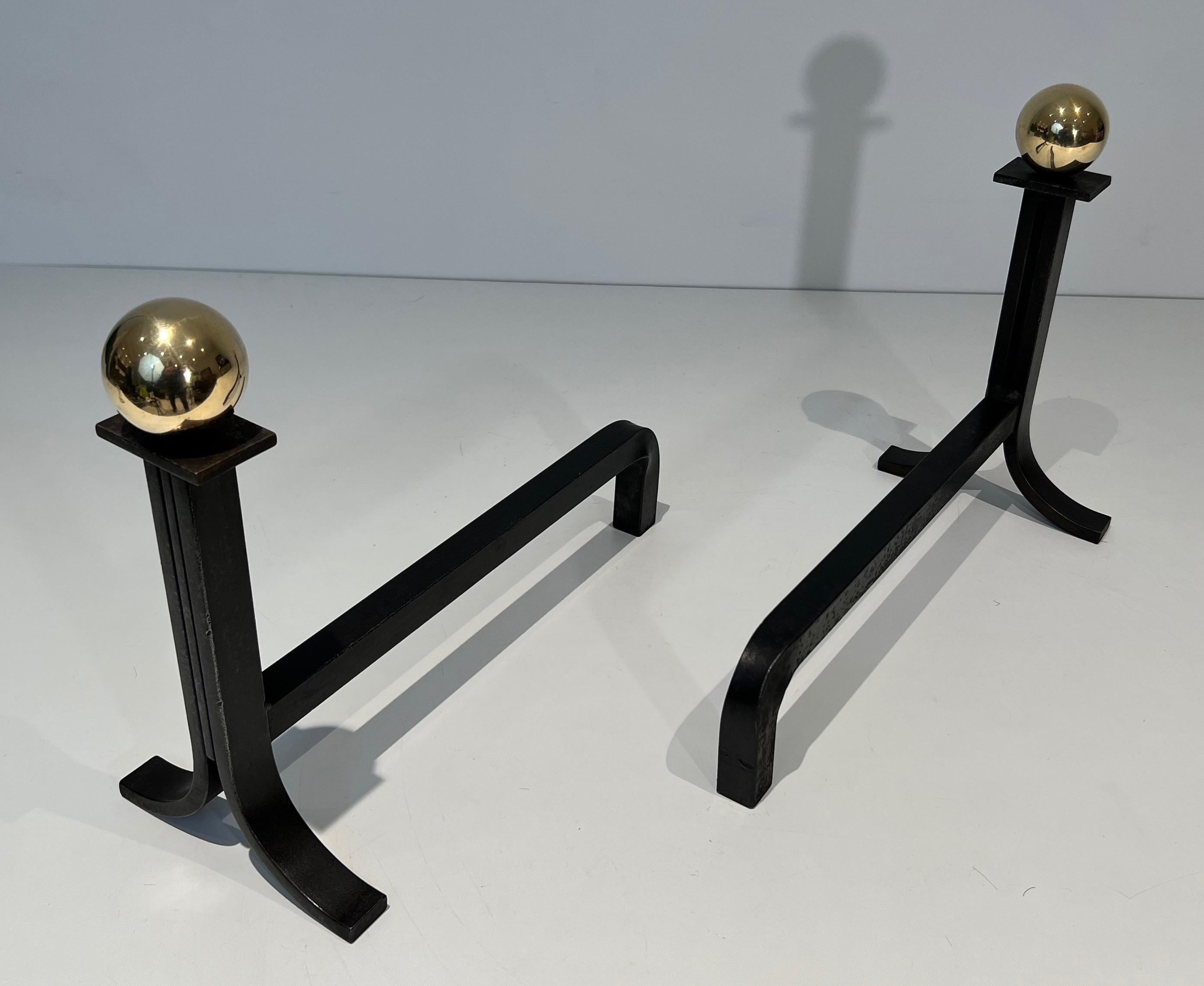 Mid-20th Century Pair of Modernist Cast Iron, Brass and Wrought Iron Andirons in the Style of Jac For Sale