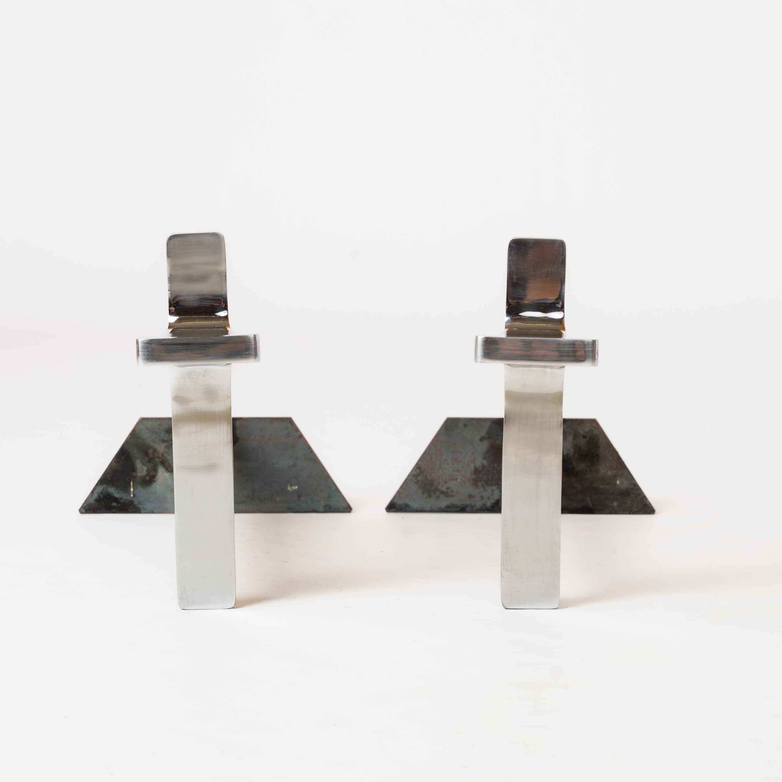 Pair of modernist chrome andirons from Jean-Charles Créations - France, 1970s. In good vintage condition.
These andirons will ship from France and can be returned to either France or to an upstate NY USA facility.
Price doesn't include shipping nor