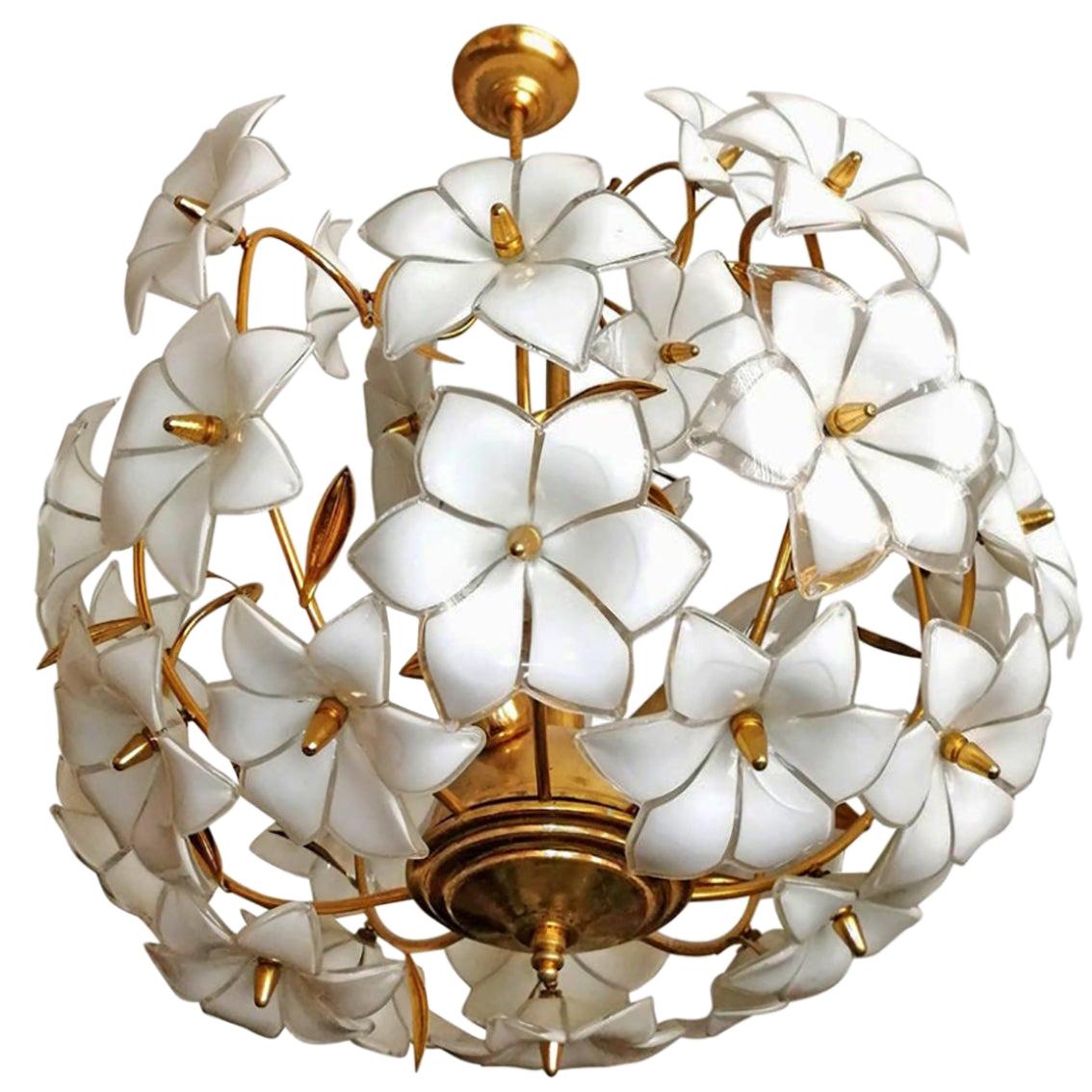 Italian Murano flower bouquet in the style of Venini art-glass with 36 hand-blow white and clear glass flowers and gold-plated brass. A few missing leaves. A pair available. 
Dimensions:
Diameter 20 in/ 50 cm
Height 32 in/ 80 cm
Weight: 18 lb/8