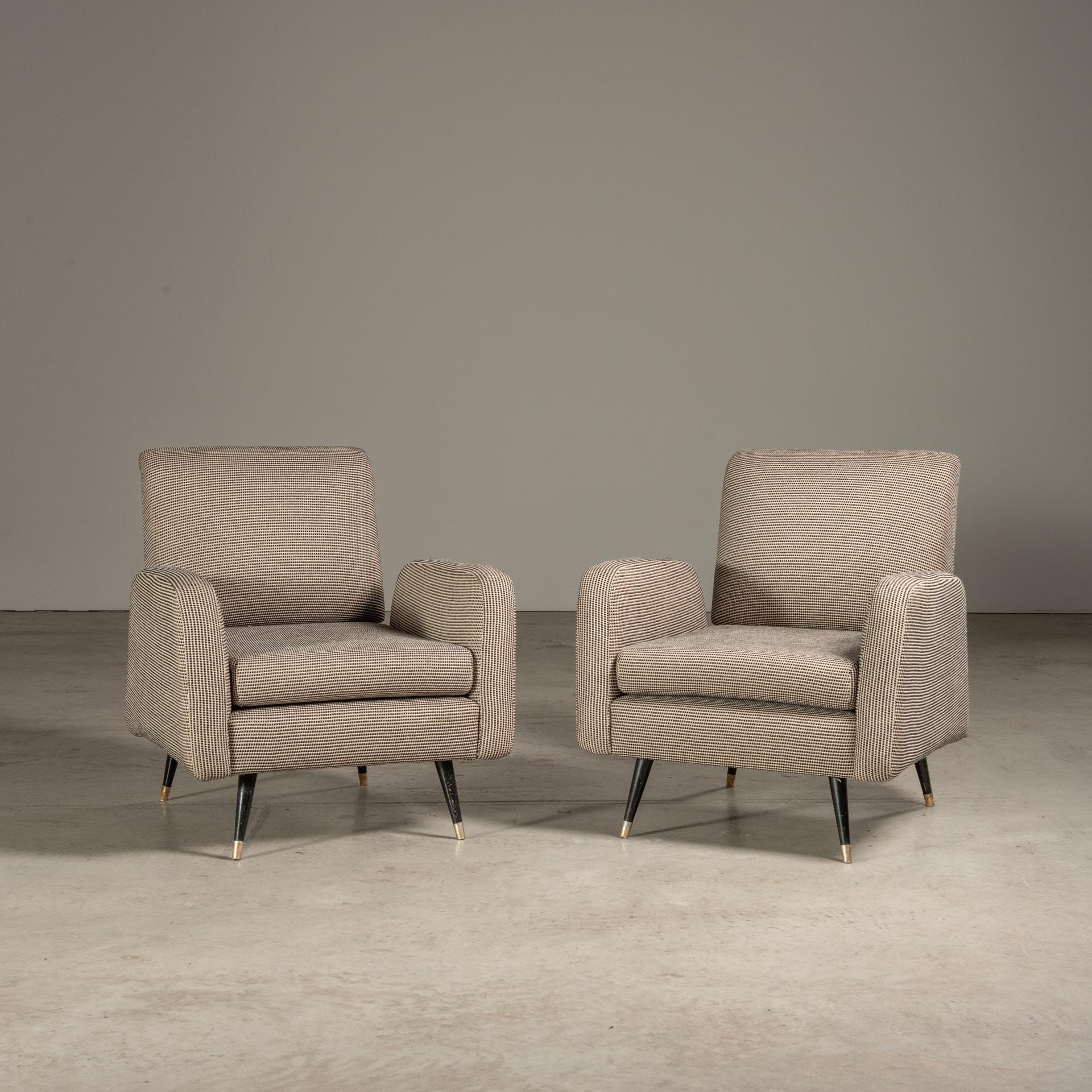 This pair of lounge chairs designed by Martin Eisler showcase the mid-century modern Brazilian style with a classic yet innovative design that harmonizes form and function.

These pieces, from the 1950s or 1960s, feature a boxy yet streamlined