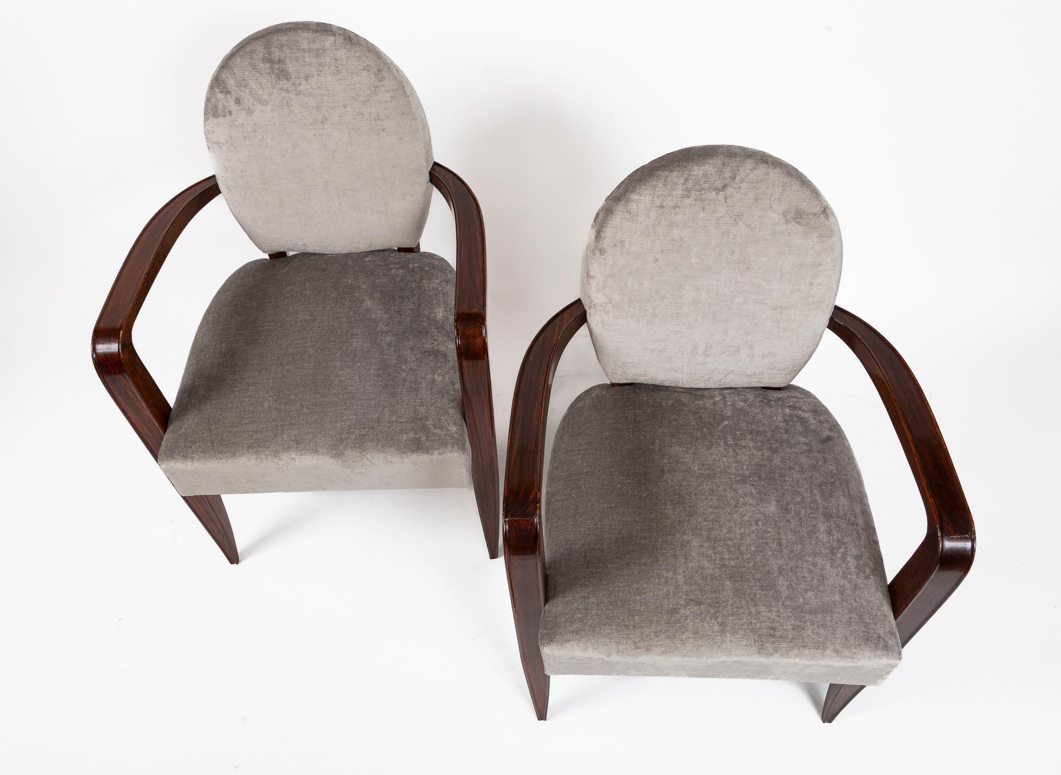 Zwei modernistische Sessel mit ovaler Rückenlehne aus afrikanischem Mahagoni von Jean Pascaud im Angebot 9