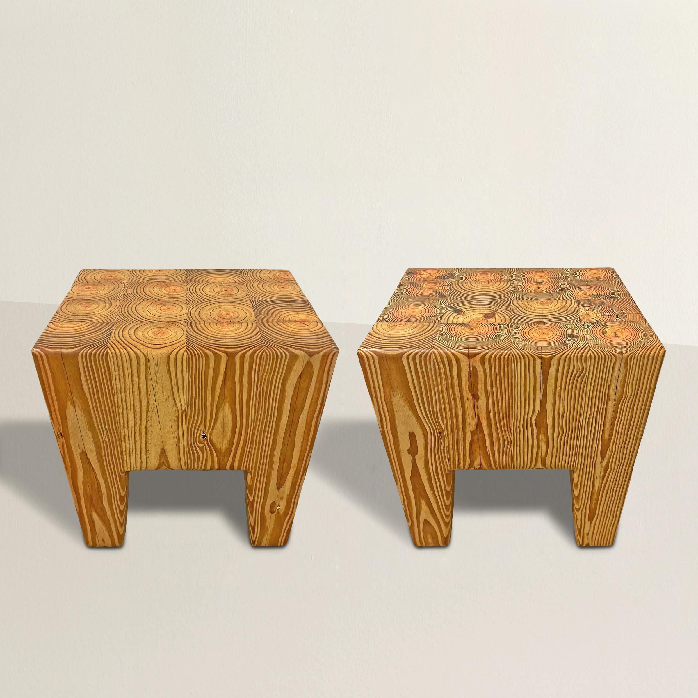 Elevate your living space with this pair of hand-crafted pine tables, a testament to the timeless allure of modernist design. Meticulously constructed from laminated center cut pine boards, these tables boast a sleek contemporary aesthetic. The