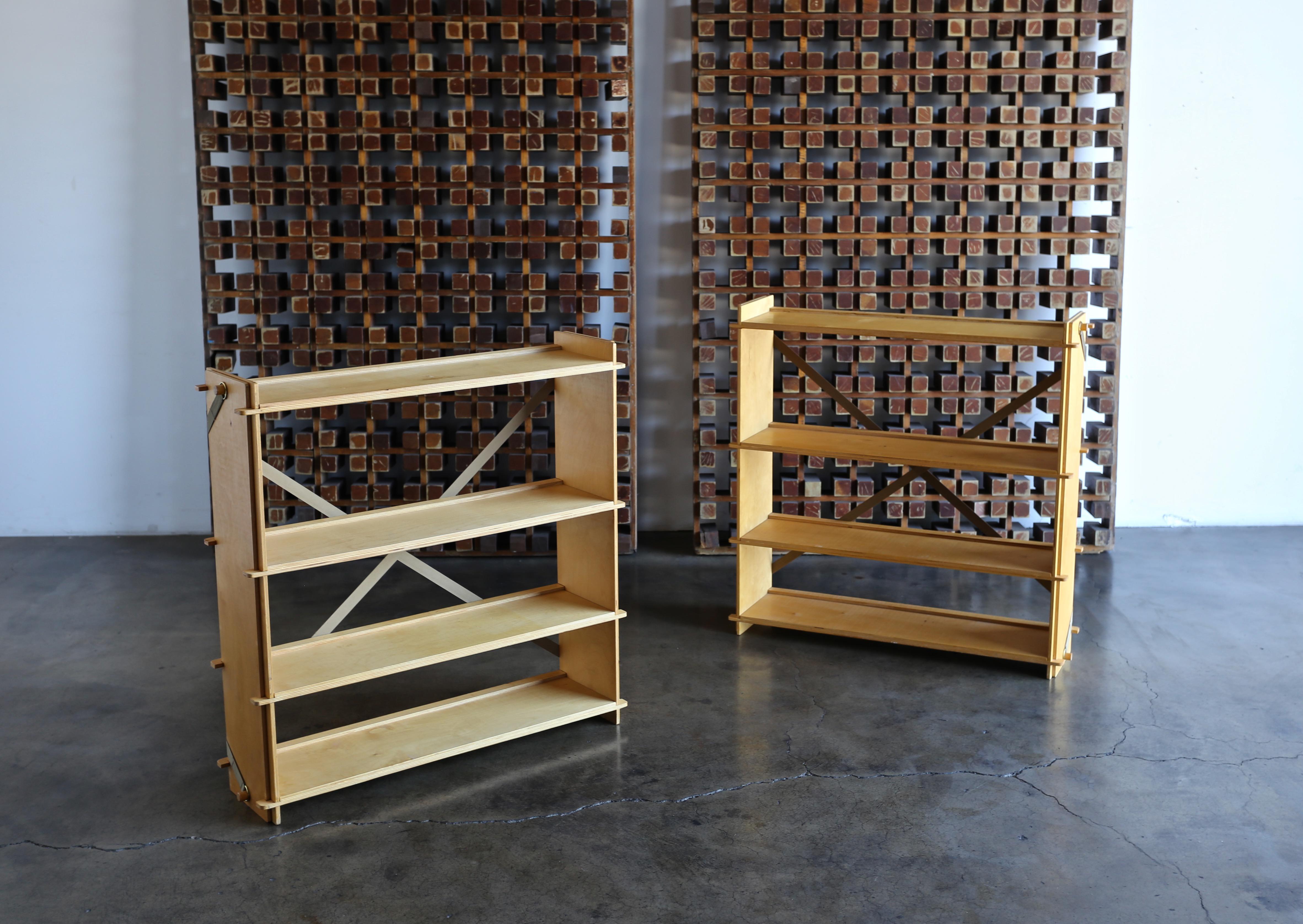 Pair of modernist plywood bookcases, circa 1975.