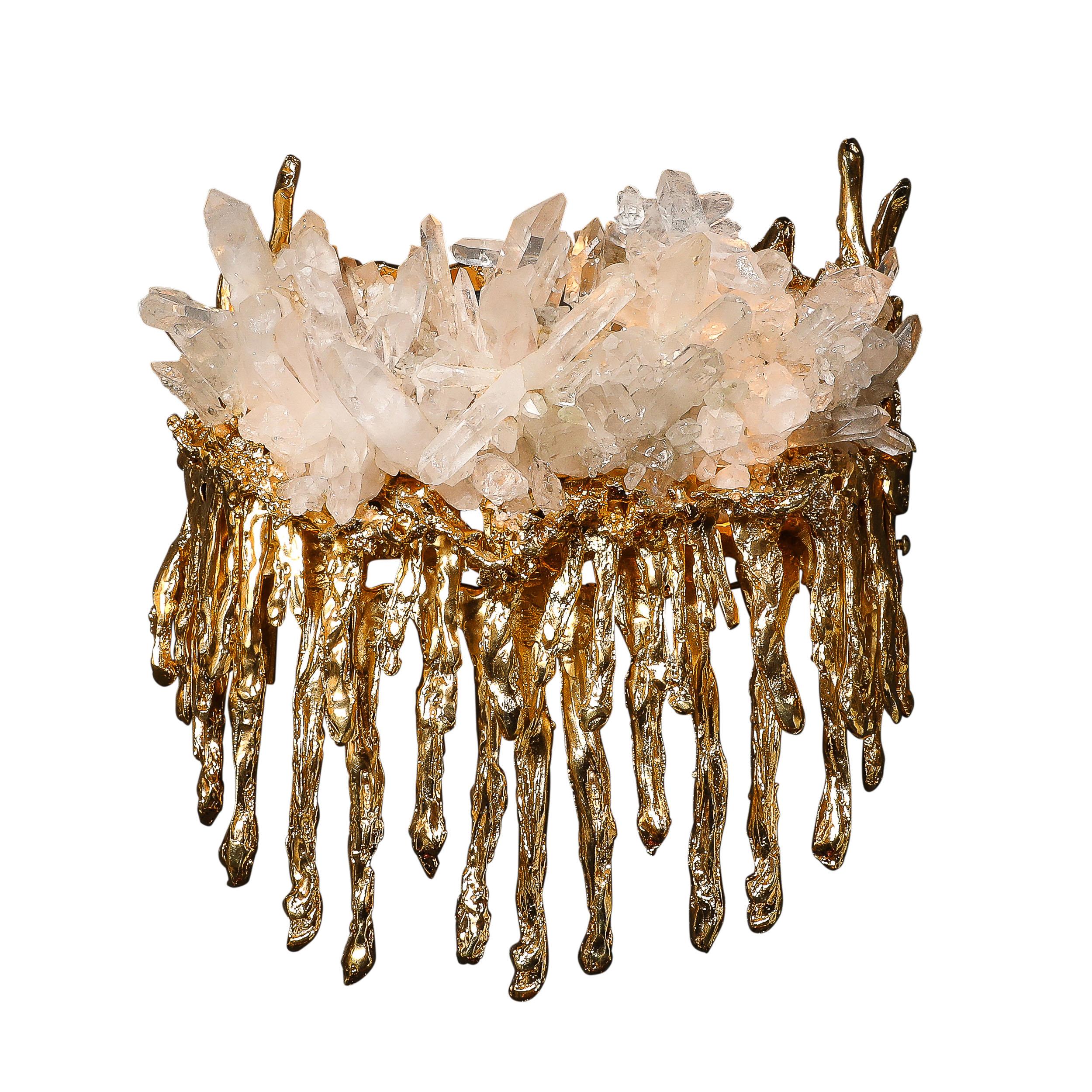 This stunningly ornate Pair of Modernist Sconces in Exploded 24Karat Gilt Bronze and Quartz Crystal is by the esteemed artist and designer Claude Boeltz and originates from France during the 20th Century. Featuring a central cluster of quartz