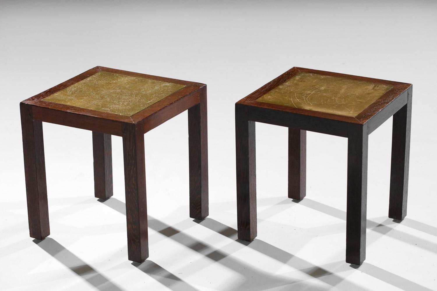 Pair of small French coffee tables from the 40s. Structure of the tables in solid palm wood with an inlay on the top of a brass leaf. Very nice vintage condition of the lot, to note traces of use (mainly scratches) on the brass. Nice patina of time