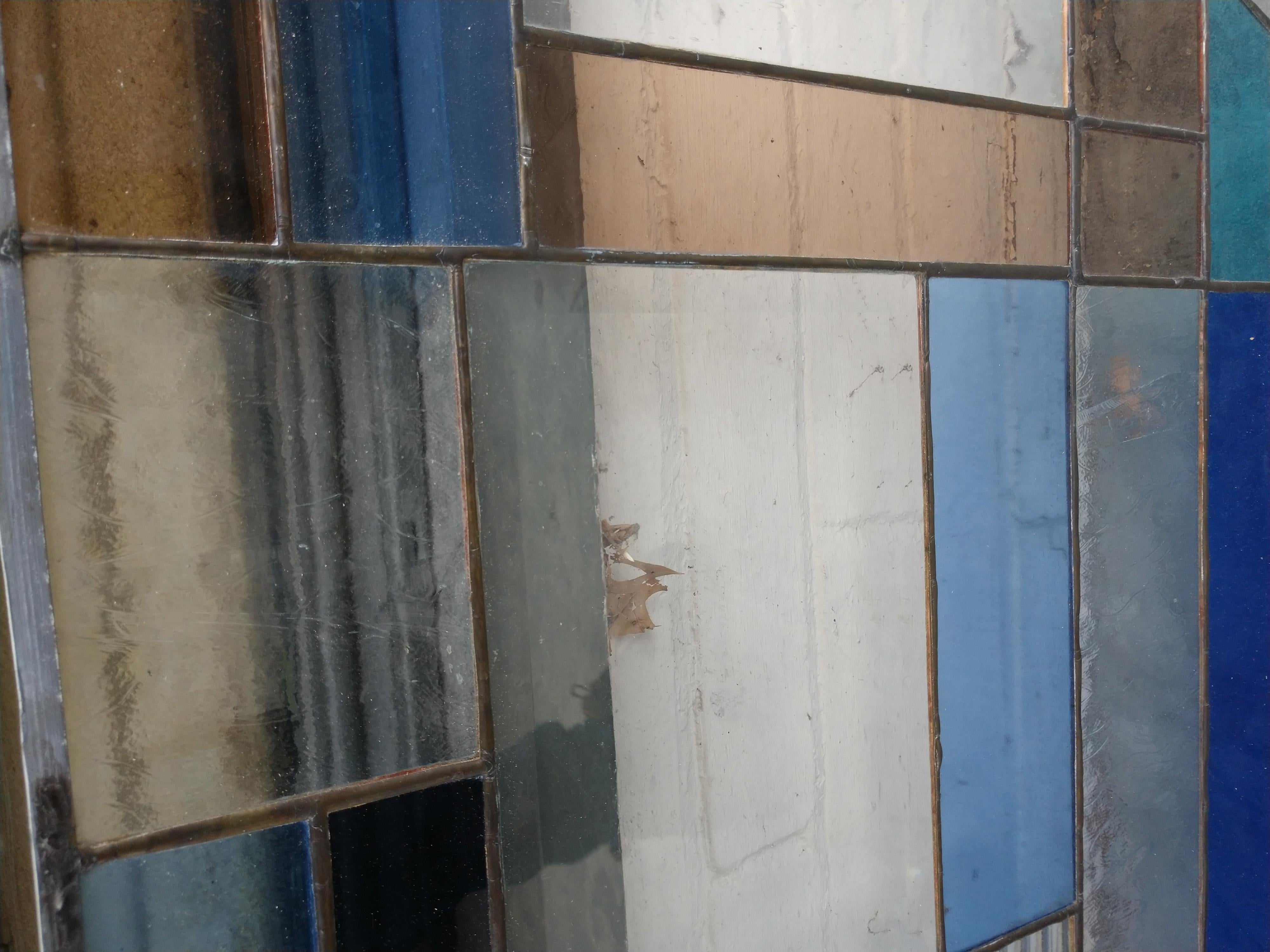 Spectacular pair of modernist stained and textured glass window panels.
In the style of the artist Mondrian. Pictures do not show the amount and different styles of the textured glass.