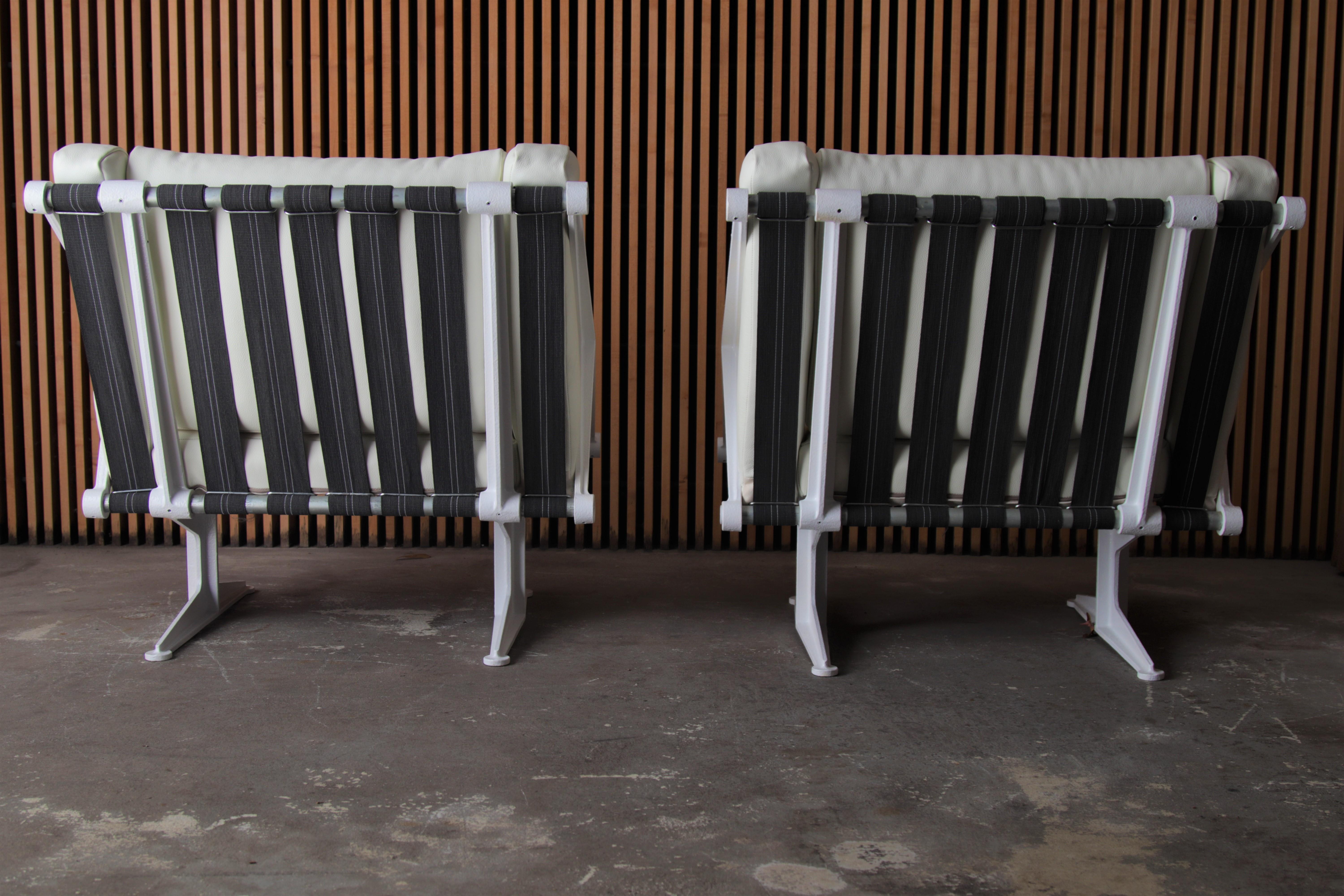 Steel Pair of Modernist Cast Aluminum and Leather Lounge Chairs after Jean Prouvé