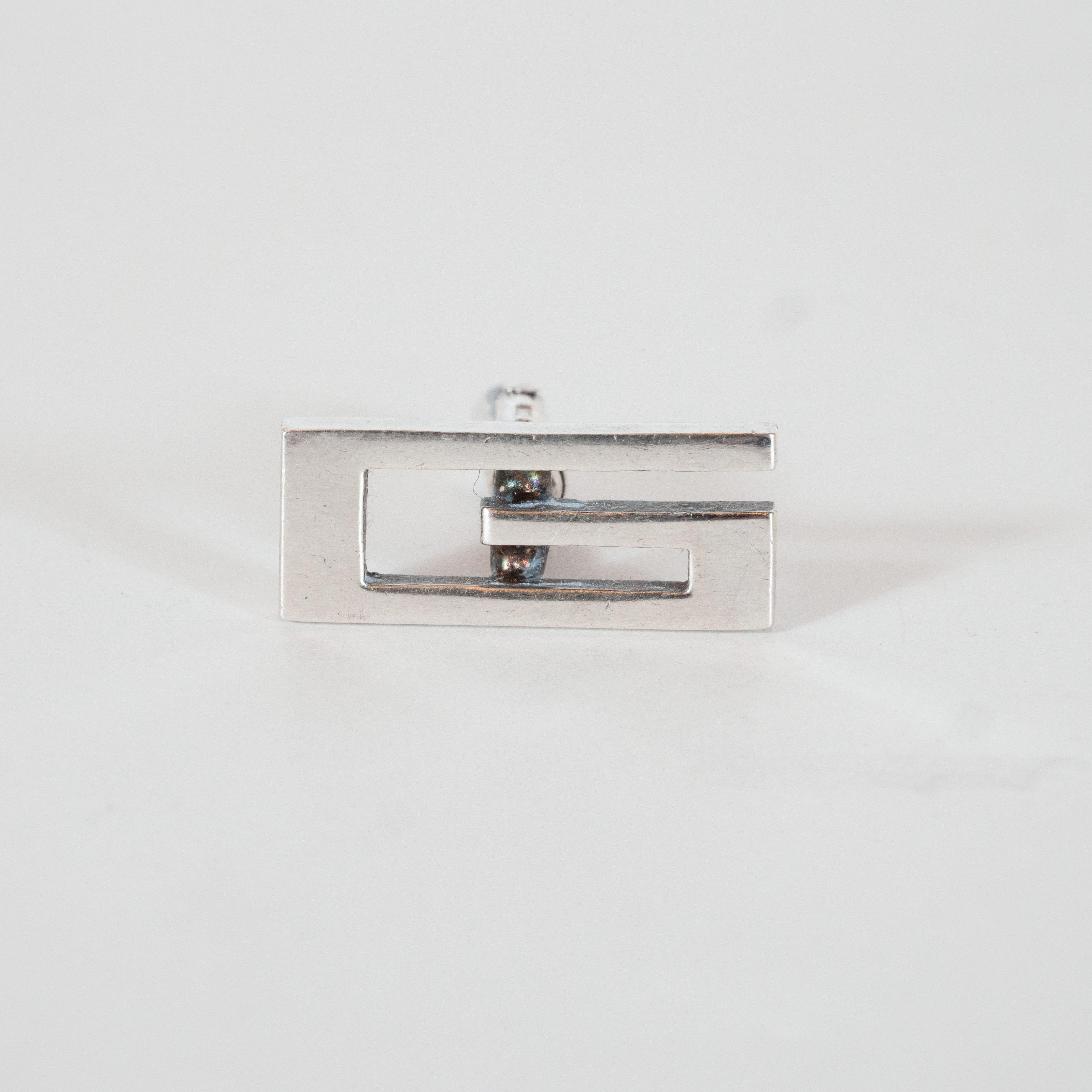 This stunning pair of cufflinks were produced by Gucci- one of the world's foremost luxury brands, based in Florence, Italy since 1921. They feature a rectilinear 
