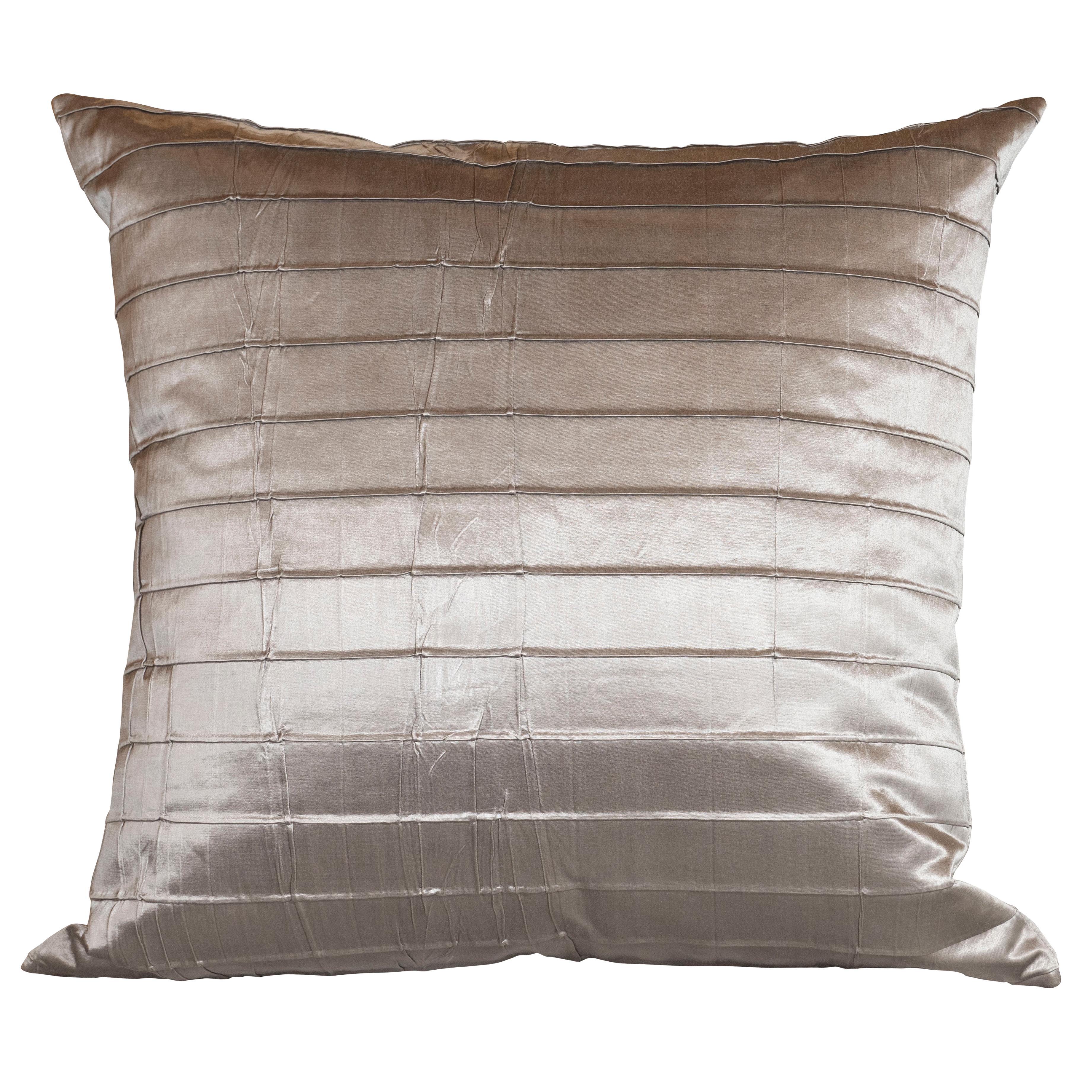 This gorgeous pair of pillows were newly fabricated in antique silver silk with a stunning sheen. They feature recurring striations throughout. With their monochromatic palate and austere pattern, they promise to add a touch of glamour to any