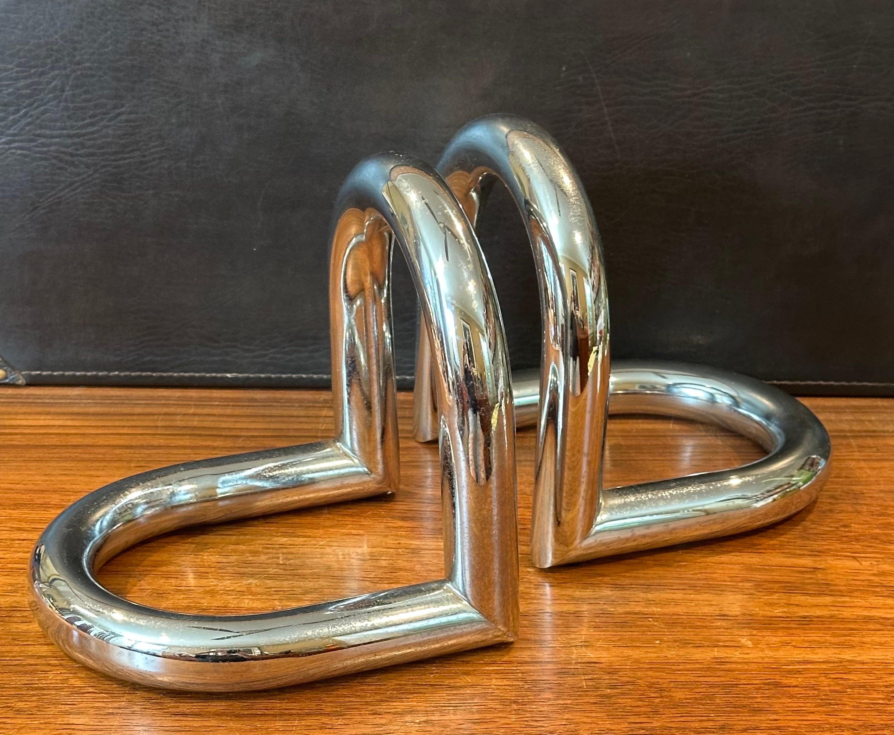 Coppia di fermalibri modernisti in cromo tubolare in vendita 9