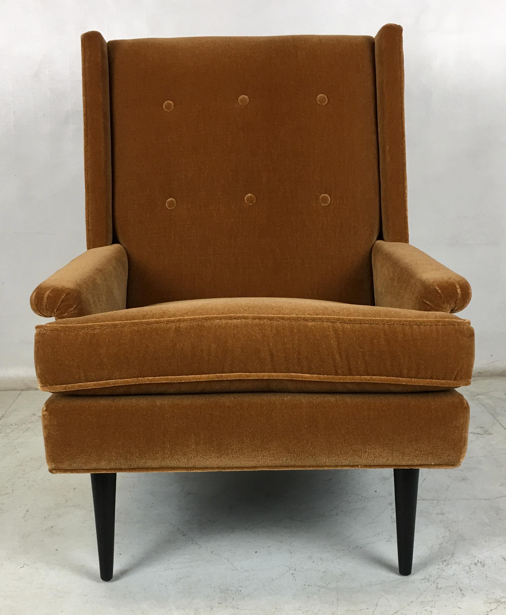 Pair of Italian Modern style lounge chairs by Karpen of California. The pair have been painstakingly restored from the ground up; reupholstered in luxurious, heavyweight burnt gold velvet with refinished legs. The chairs are extremely comfortable as