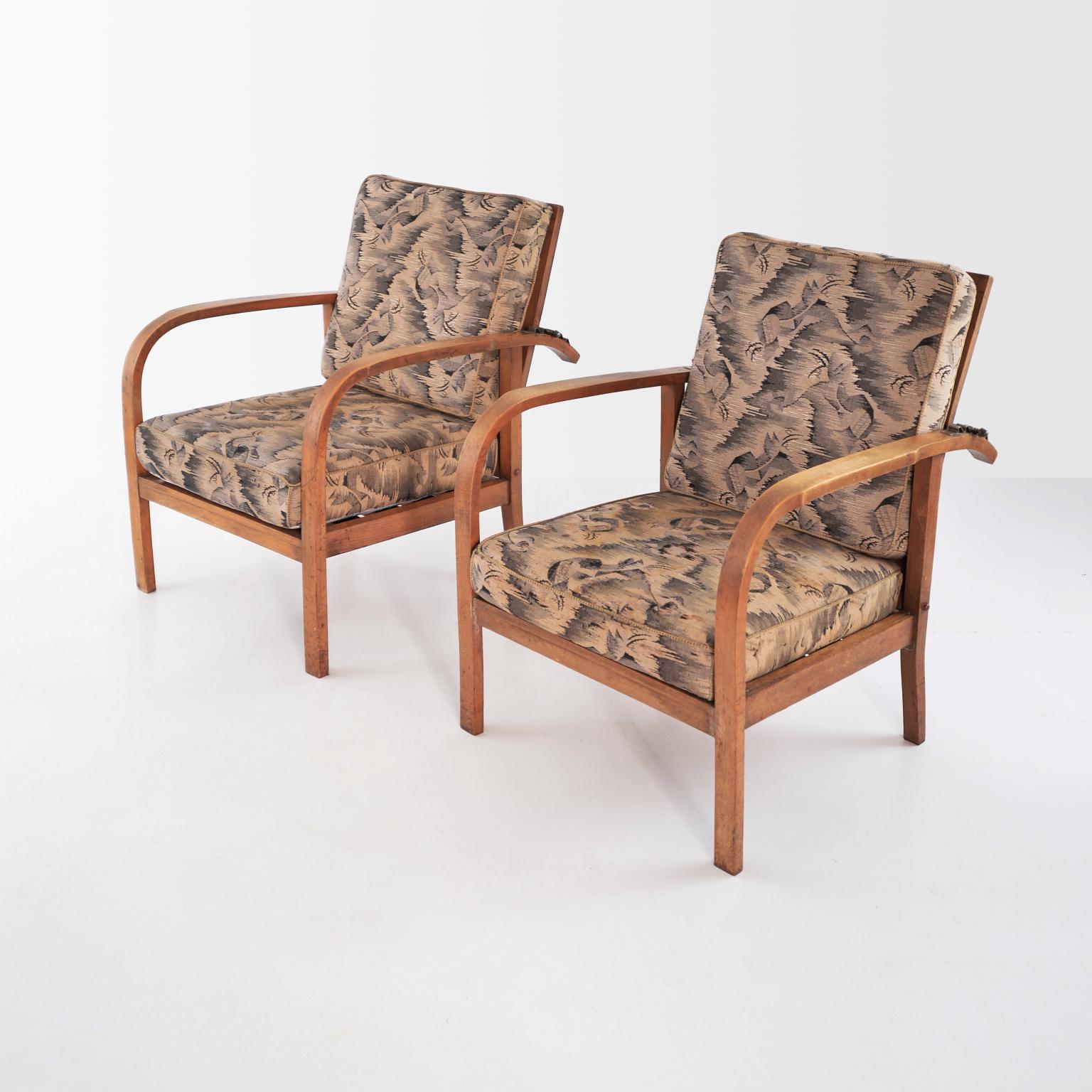 Pair of modernist wooden reclining armchairs by Jan Vanek with original upholstery. The armchairs were manufactured by UP Závody Brno, circa 1935.

Jan Vanek (1891–1962) was architect, designer, furniture manufacturer and publicist. A prestige