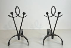 Pair of modernist wrought iron andirons. French work. Circa 1940