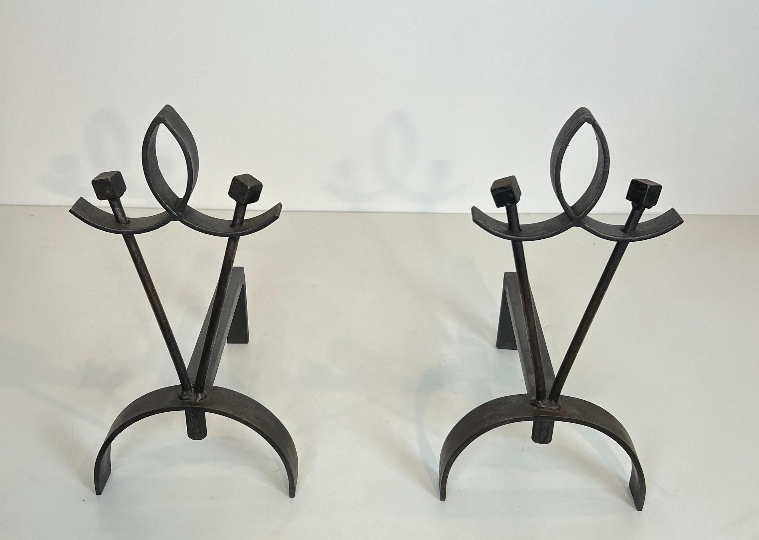 Mid-Century Modern Pair of modernist wrought iron andirons. French work. Circa 1940 For Sale