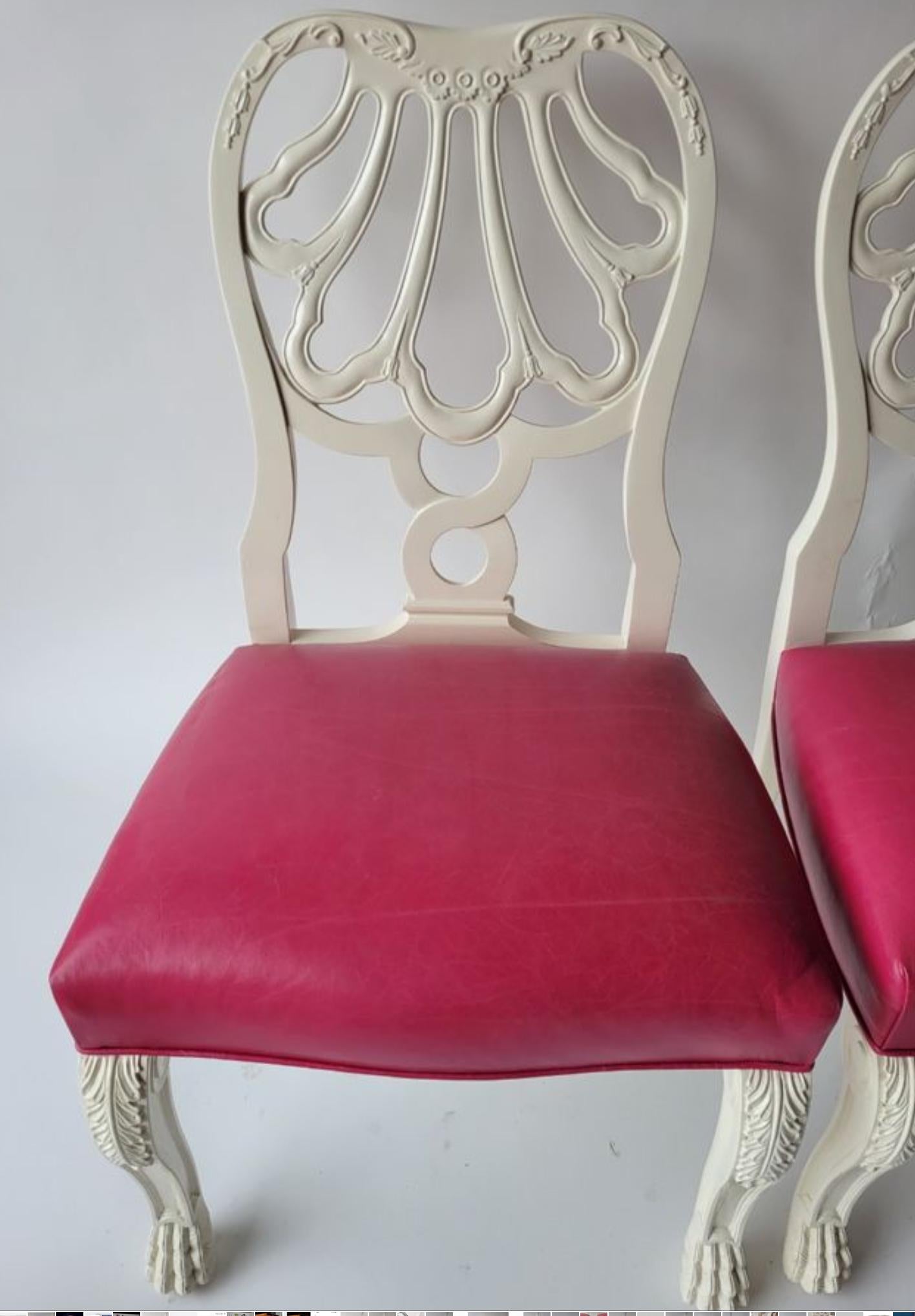 Pair of Charlotte Moss Hollywood Regency White Lacquer & Pink Leather Dining Chairs.
This listing is for one pair of side chairs but we have three pair available plus one pair of matching arm chairs. They were part of a Charlotte Moss design