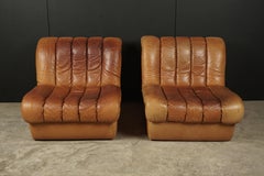 Paire de chaises longues modulaires en cuir de De Sede:: modèle DS85
