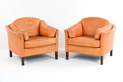 Paire de fauteuils club en cuir Mogens Hansen, vers les années 1970