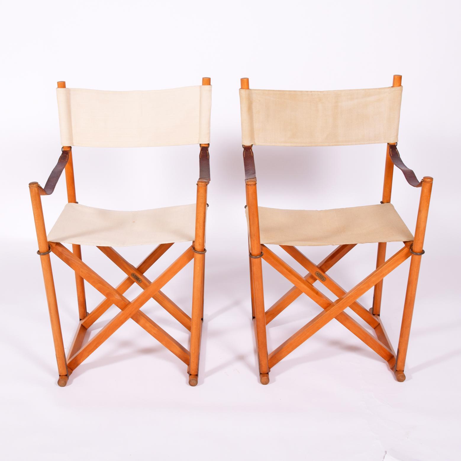 Pair of folding chairs designed by Mogens Koch in 1932 for a church as extra seating ,Beachwood canvas brass this model made by Interna Denmark cabinetmaker in 1960’s.
