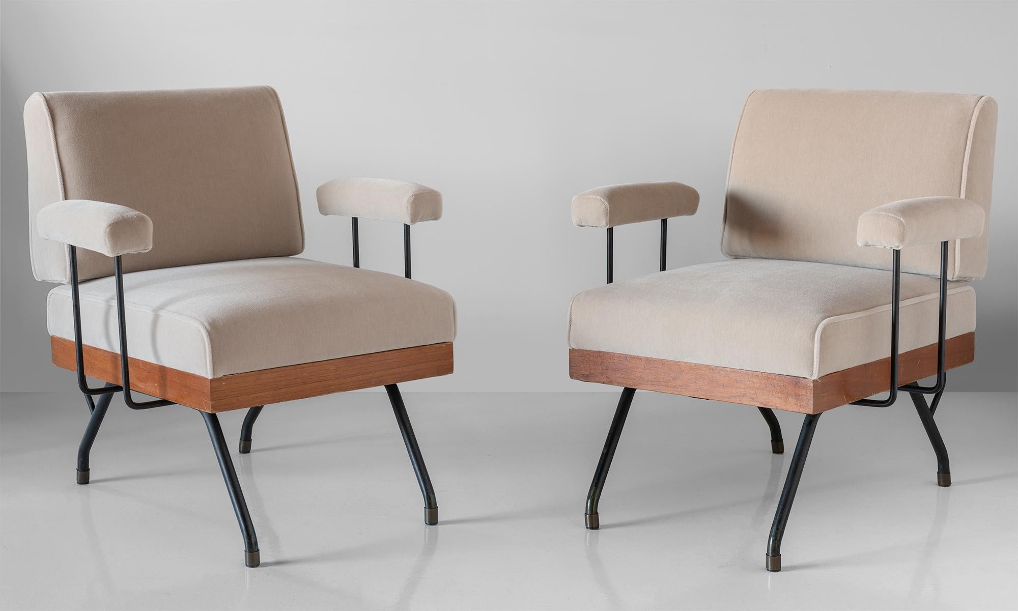 Pair of mohair, metal, and wood modern armchairs, Italy circa 1960.

Dynamic modern form, newly upholstered in mohair fabric by Maharam.