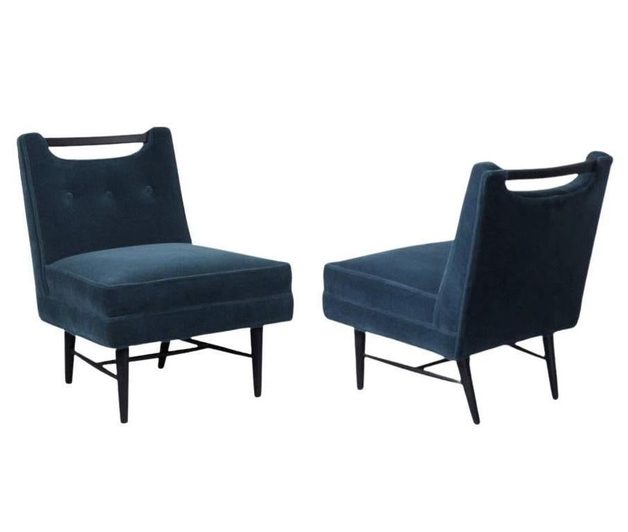 Enjoy leisure time with this pair of glamorous slipper lounge chairs in the style of Harvey Probber c.1950's. Very comfortable and well-constructed. A modern update on a classic design, each showcases a slipper silhouette with gorgeous attention to