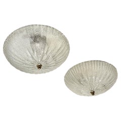 Pair of Molded Glass Light Fixtures. Sold Individually.