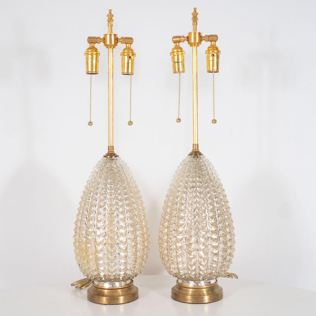Pair of molded mercury glass table lamps with brass hardware.