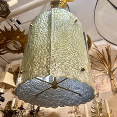 Paire de lanternes en verre moulé et miroité, vendues individuellement