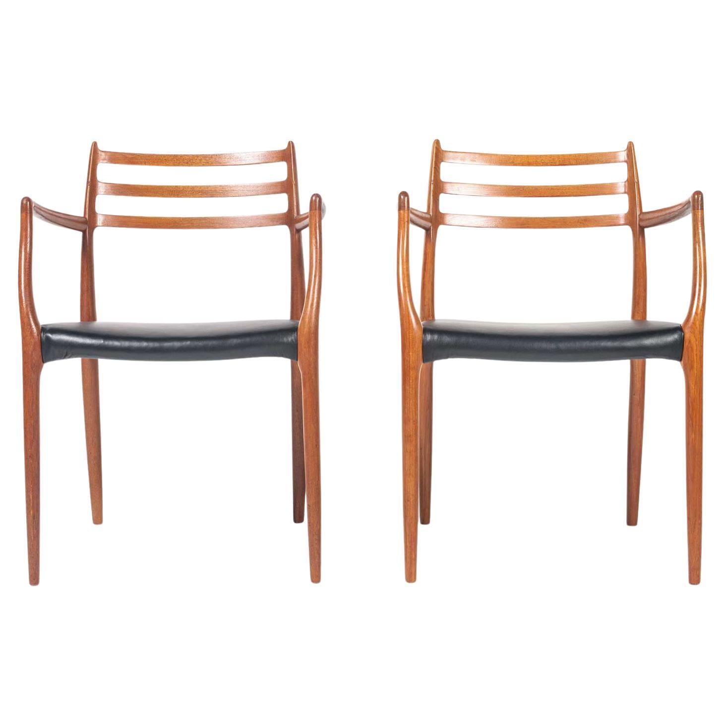 Pair of Moller 62 in Teak and Black Leather