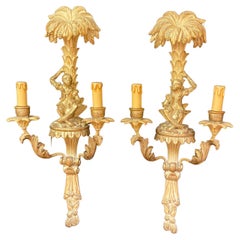 Pair of "monkey" sconces in wood and gilded stucco. , XVIII style