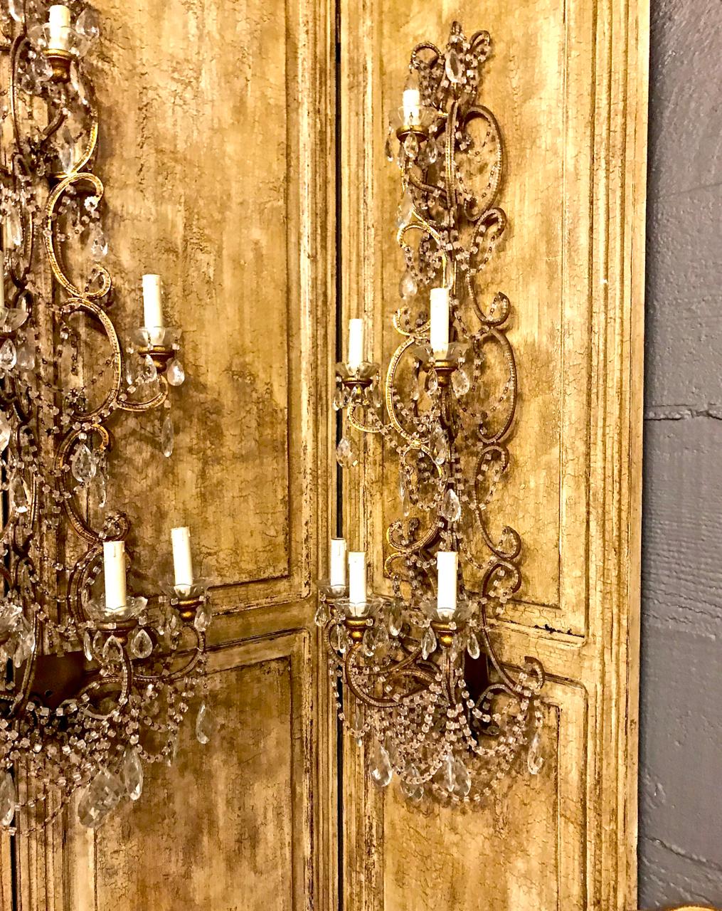 This is a superb pair of very large mid-20th century. Italian beaded sconces. The stunning sconces feature row upon row of 