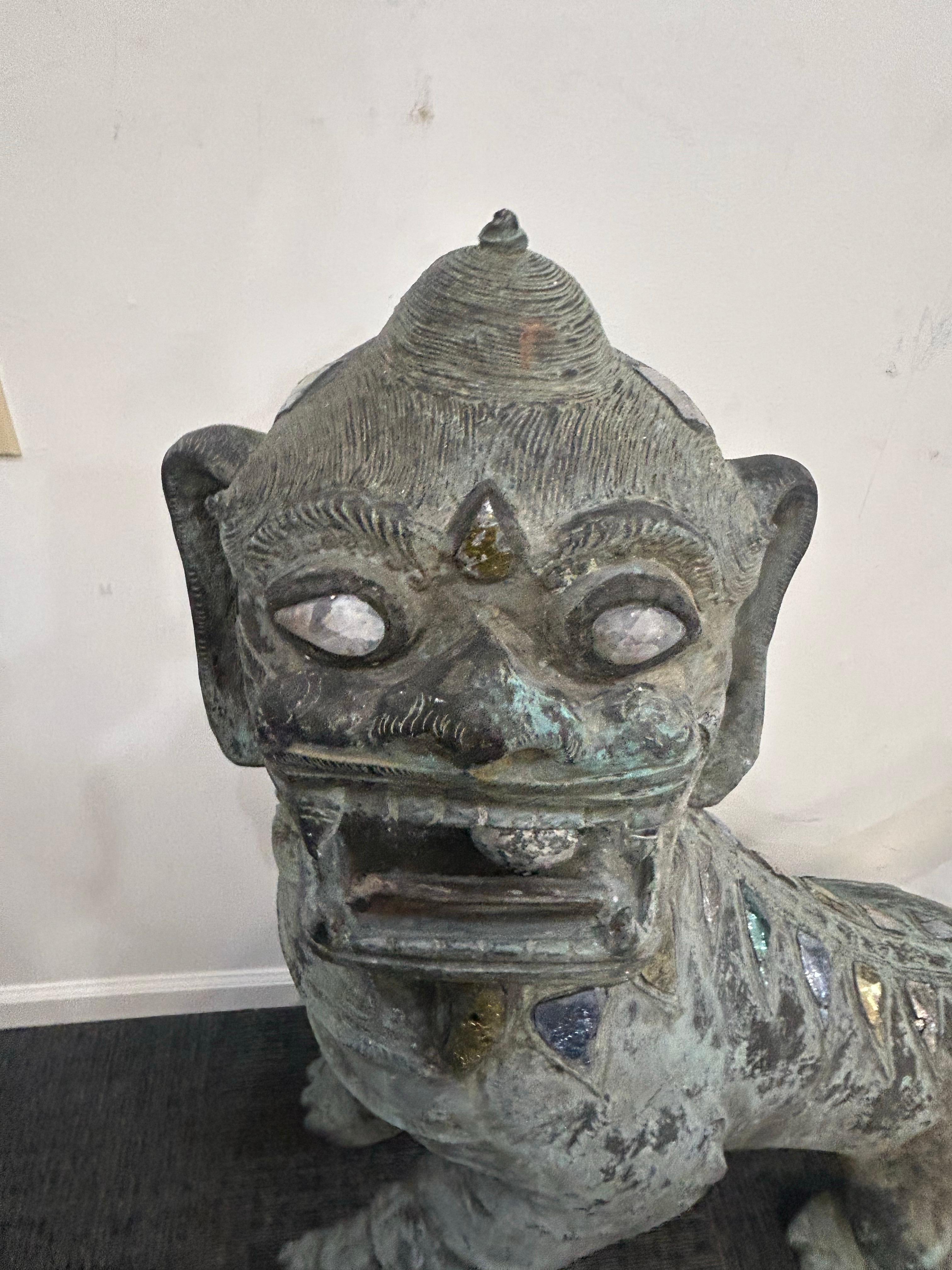 20th Century Pair of monumental bronze Foo Dogs For Sale