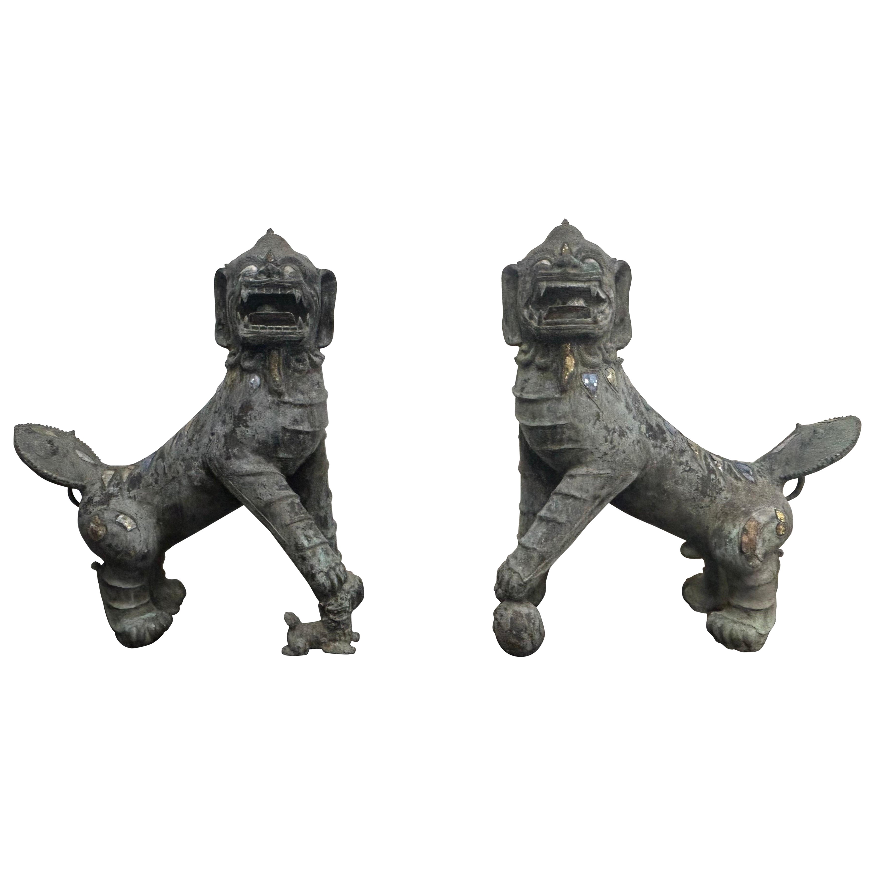 Pair of monumental bronze Foo Dogs For Sale