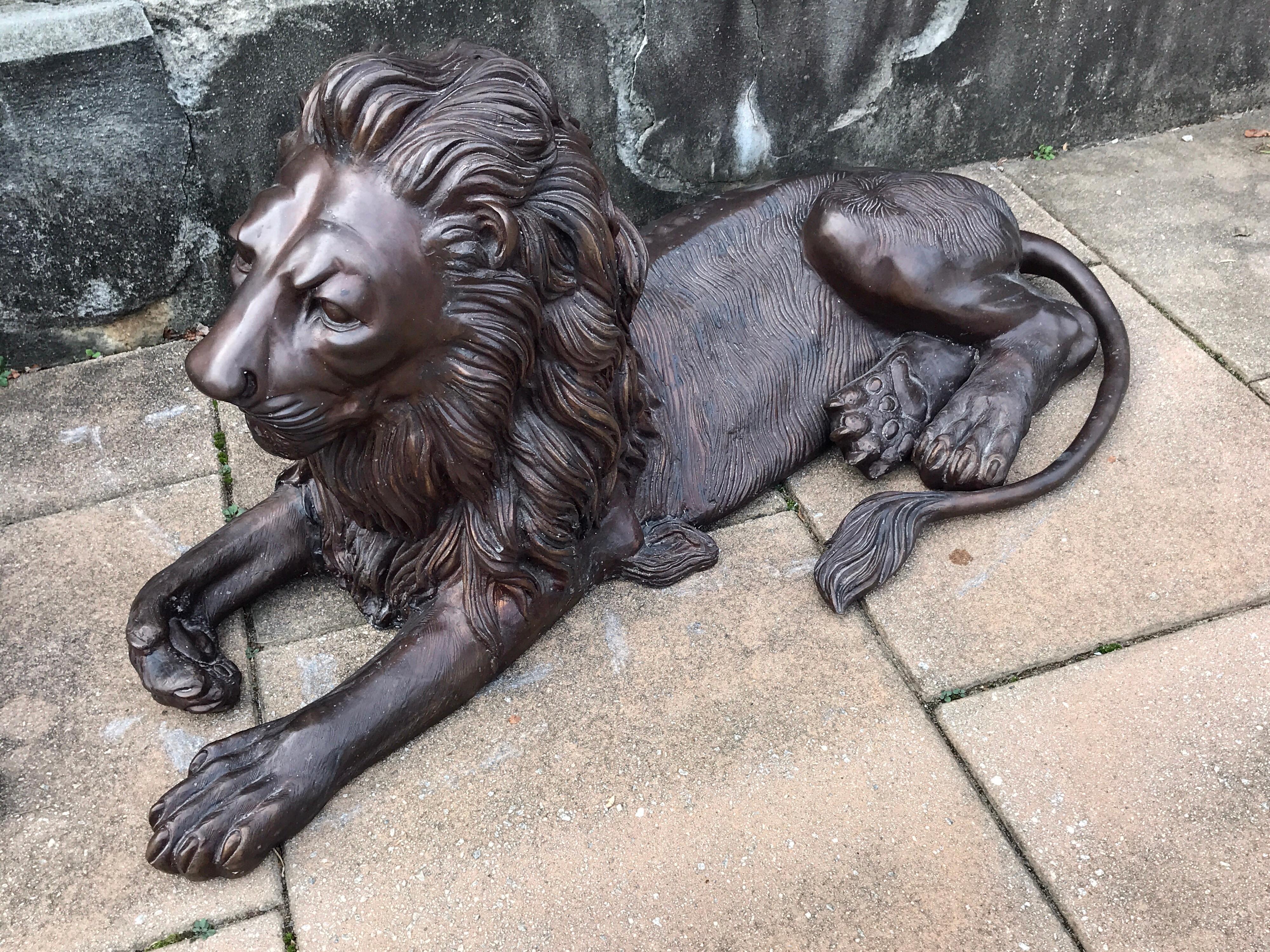 Pair of Monumental Bronze Recumbent Lions In Good Condition In Atlanta, GA