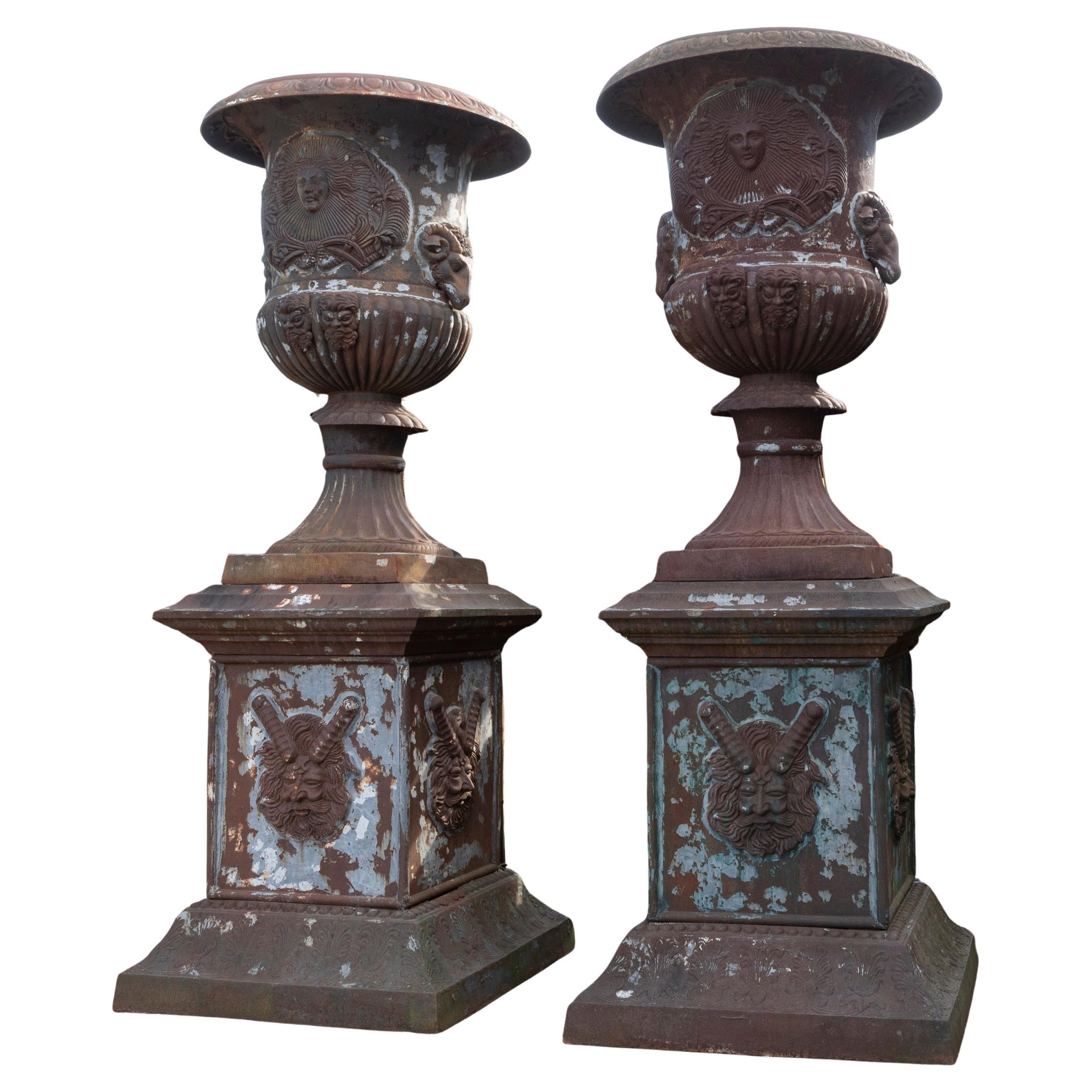 Pair of Monumental Cast Iron Urns on Plinths For Sale