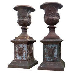 Pair of Monumental Cast Iron Urns on Plinths