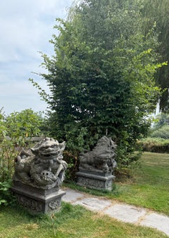 Pair of Monumental Chinese Carved Granite Foo Dogs, Early 20th Century