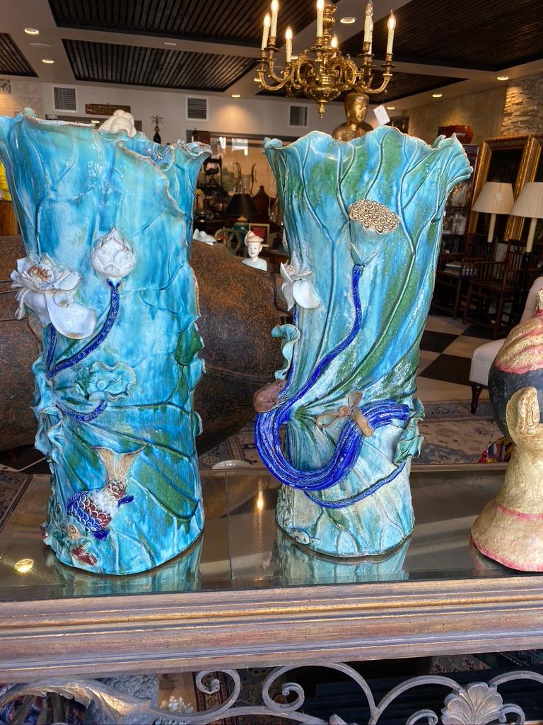 Pair of Monumental Chinese from the Shi Wan Kilm in Guangzhou, China hand made and sculptured formed lily pads for each glazed with 