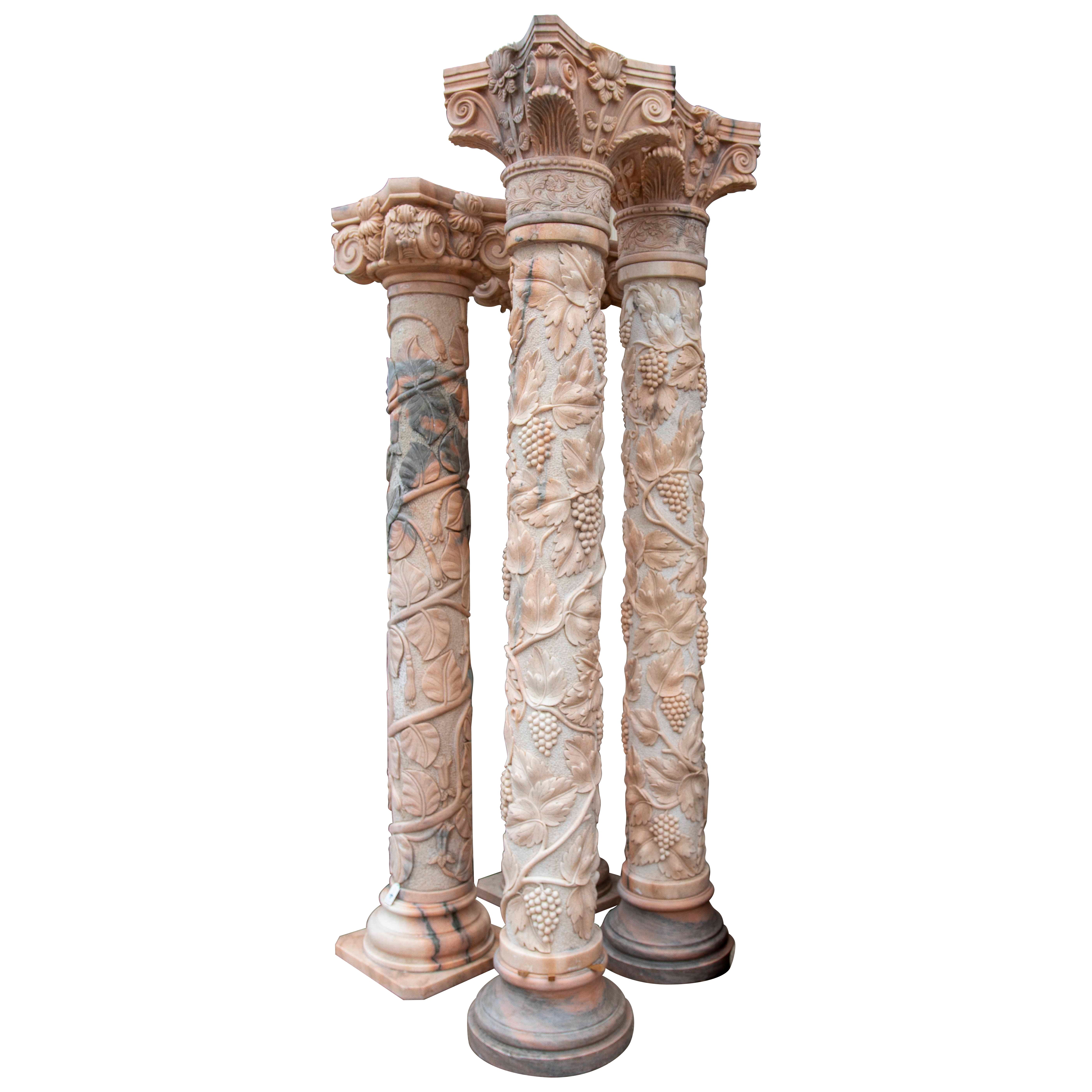 Pair of Monumental Columns in Carved Marble with Vine Motifs, Classical Style For Sale