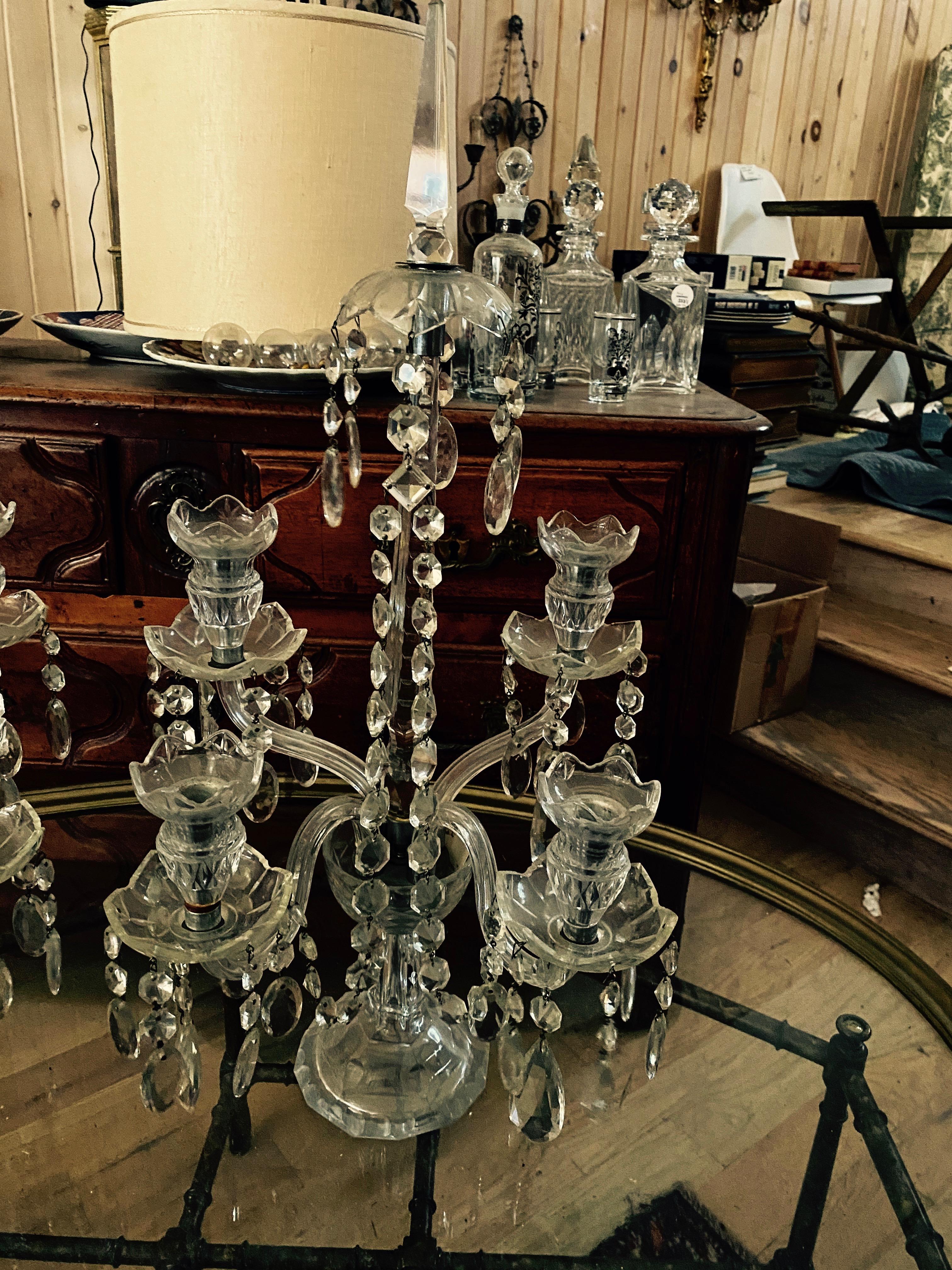 Spectacular pair of monumental crystal, rock crystal and brass candelabra. Electrified.  Great Scale And Proportions.