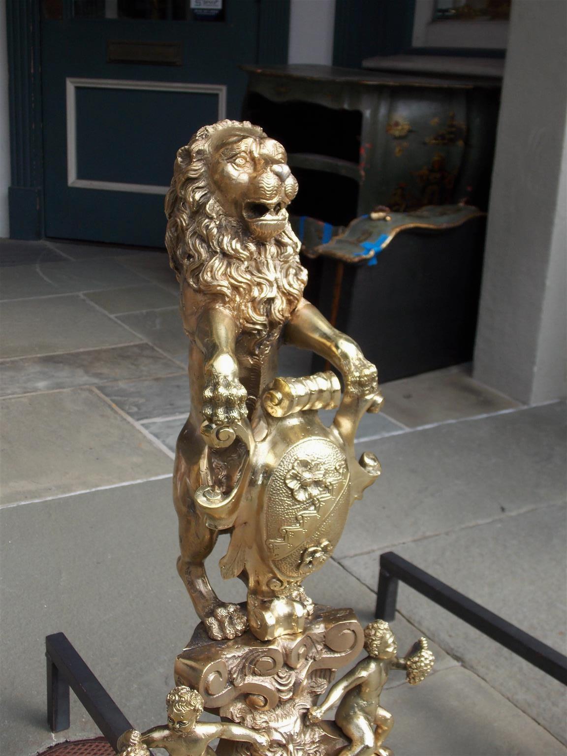 Pair of Monumental English Brass Medallion Lion Andirons with Paw Feet, C. 1820 In Excellent Condition In Hollywood, SC
