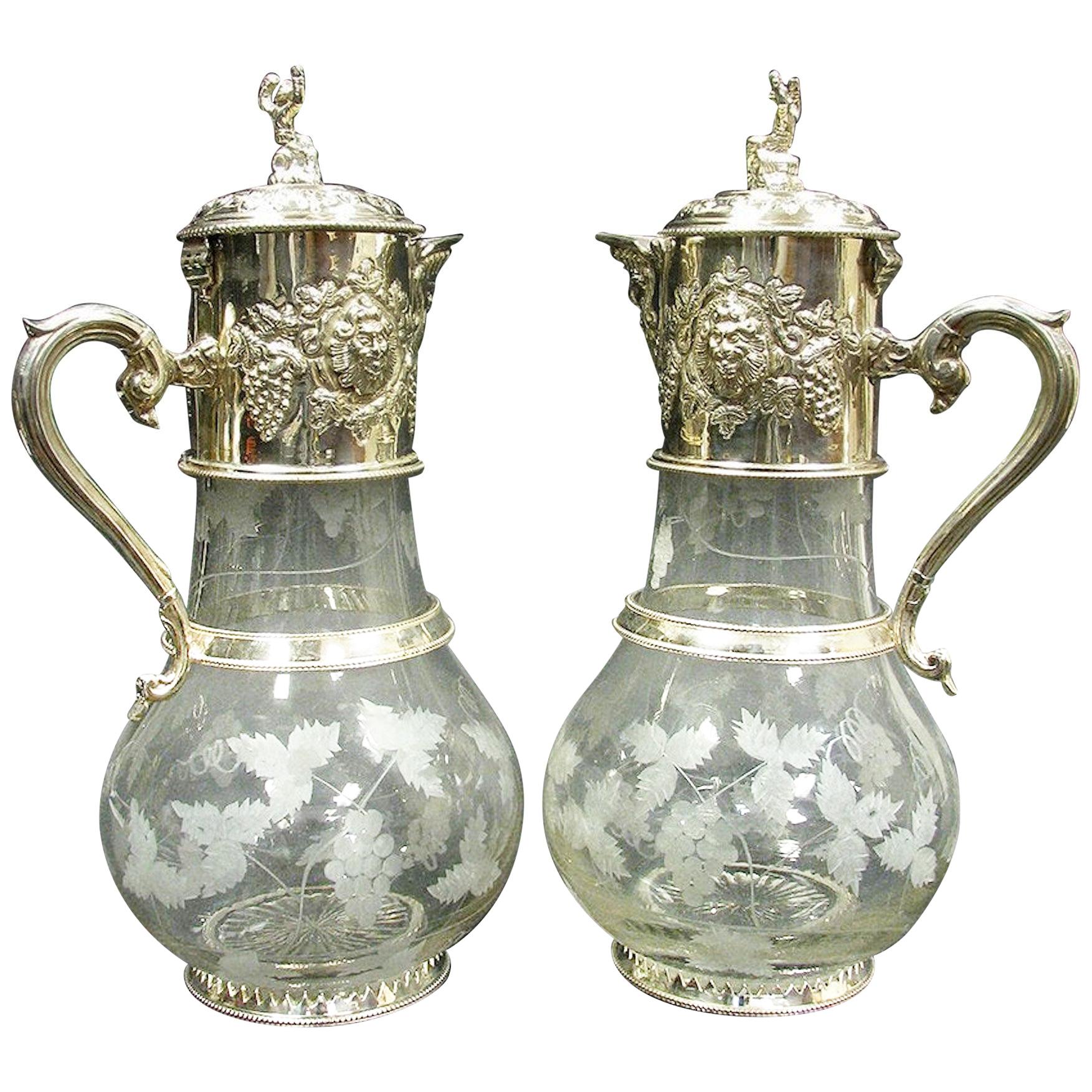 Pair of Monumental English Sliver Plated and Engraved Glass Claret Jugs