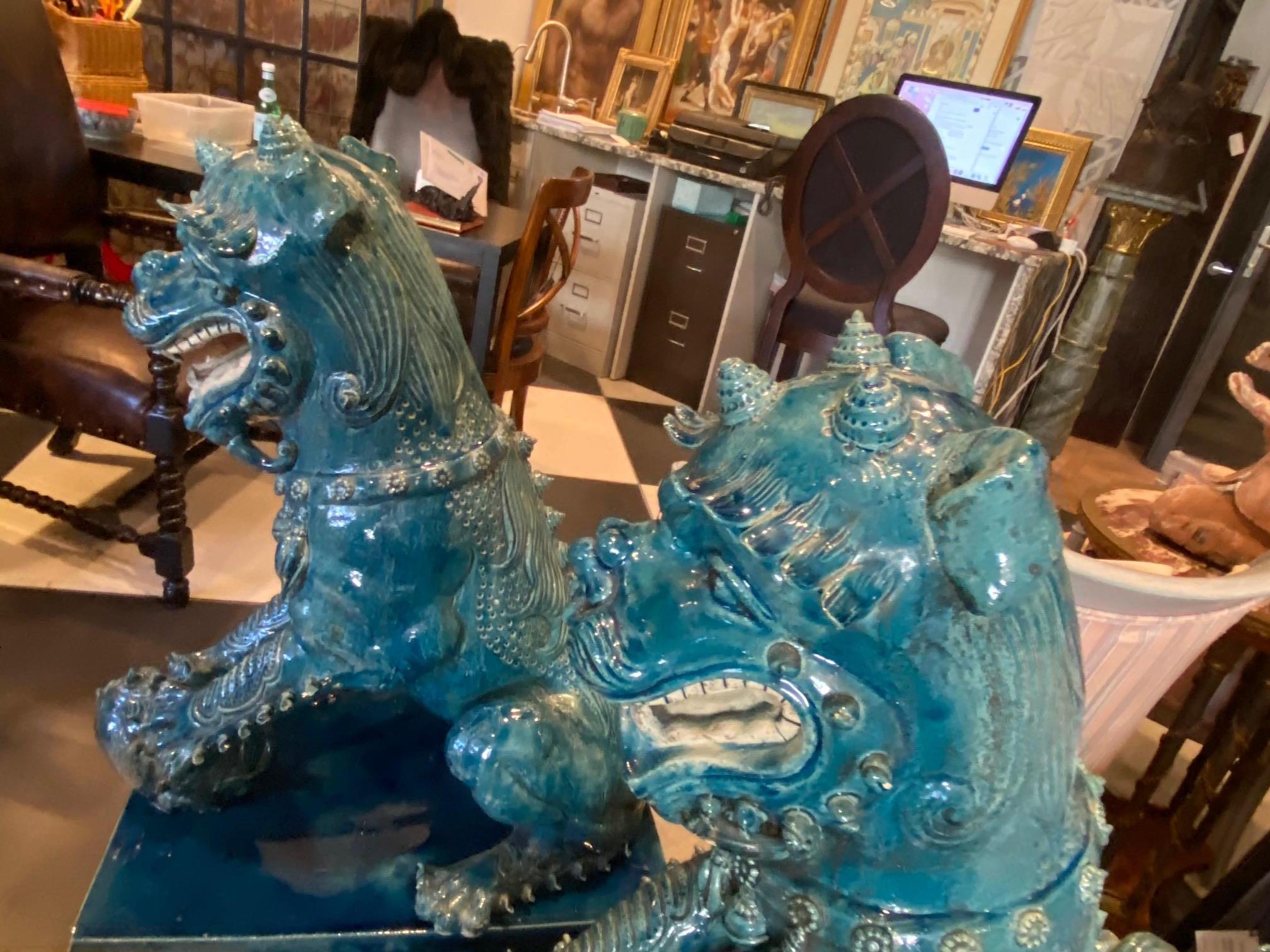 Pair of Monumental Foo Dogs on Stands In Good Condition In Sarasota, FL