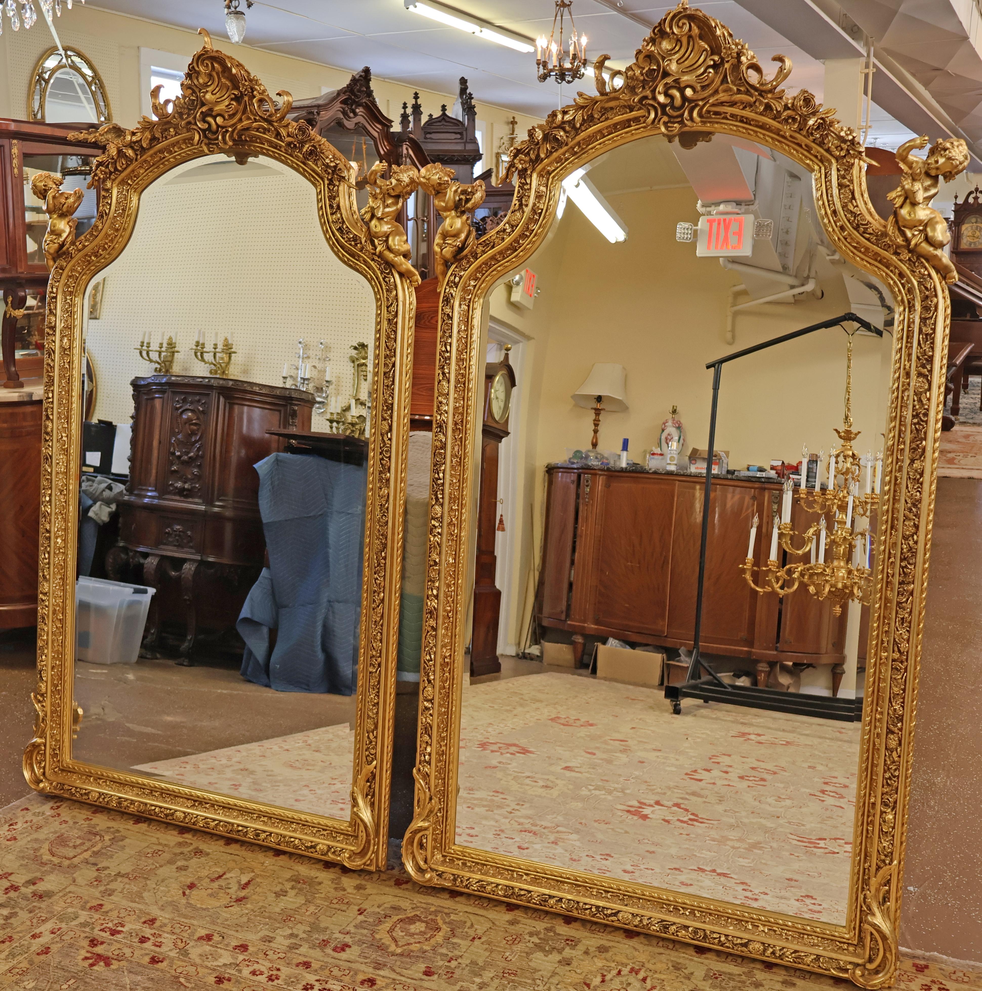 Pair of Monumental Gold Gil Louis XVI French Style Cherub Putti Beveled Mirrors  In Good Condition For Sale In Long Branch, NJ