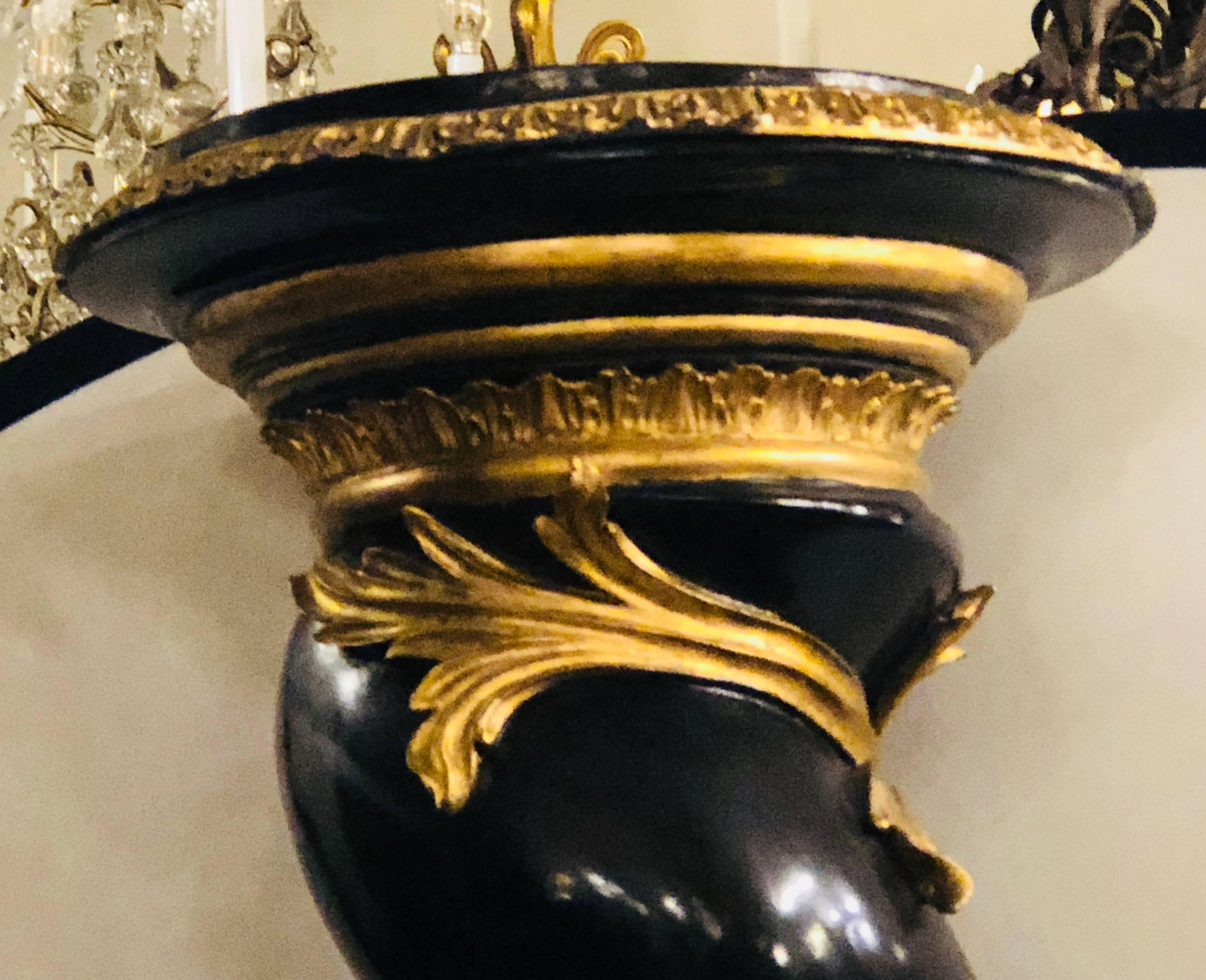 Pair of Monumental Hollywood Regency Style Pedestals Ebony and Gilt Gold Detail In Good Condition In Stamford, CT