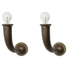 Pair of monumental Italian 1930s Art Deco bronze wall lamps